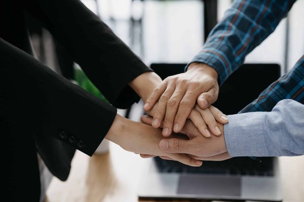 What is the Best Way to Coordinate a Herringbone Coat with Your Business Attire?